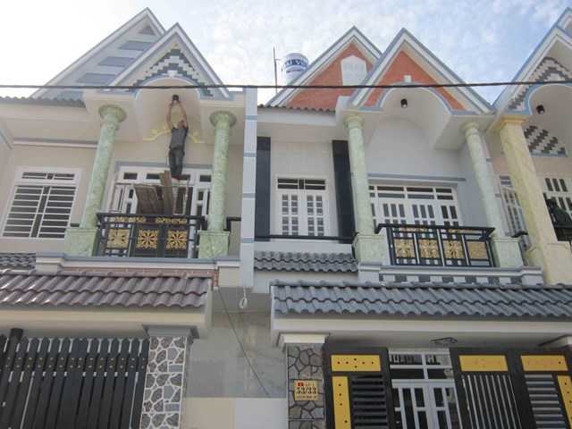 Bán nhà ngay chợ Tân Phước Khánh, Tân Uyên sổ hồng riêng, trả góp qua ngân hàng Lh 0983744879